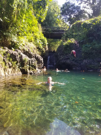 Swimming in fresh waterfall pool of Ching''s Pond on Road to Hana!